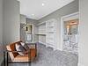 Fall in love with this oversize master suite closet with tons of storage and connects to the laundry room.